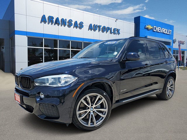 2018 BMW X5 xDrive50i in Black — front three-quarter view