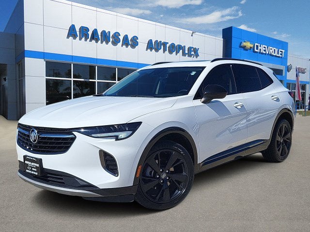 2023 Buick Envision Essence in Summit White — front three-quarter view